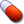 A large red pill